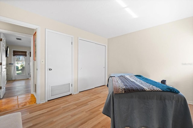 bedroom featuring light hardwood / wood-style floors