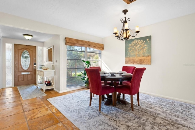 dining area with a chandelier