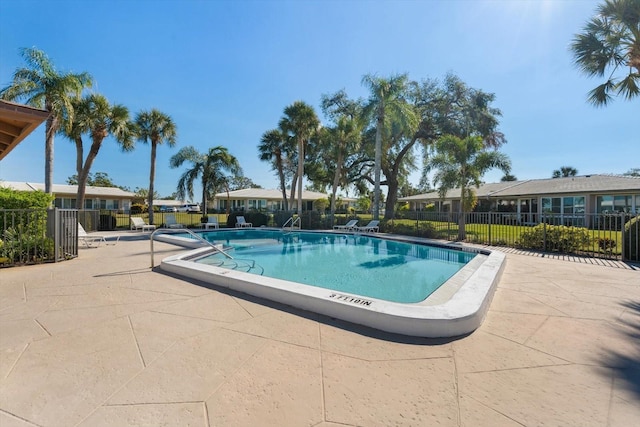 view of pool featuring a patio