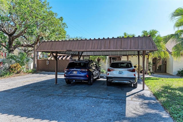 view of car parking featuring a carport