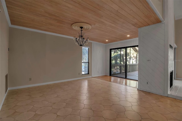 empty room featuring a chandelier, crown molding, and wooden ceiling