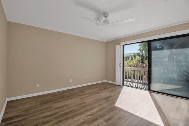 unfurnished room featuring wood-type flooring, a textured ceiling, and ceiling fan