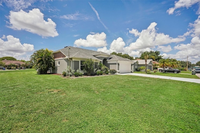 ranch-style house featuring a front lawn and a garage