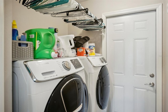 laundry area featuring separate washer and dryer