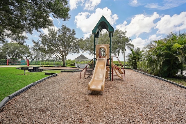 view of jungle gym with a yard