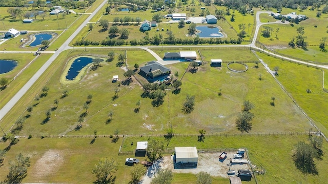 aerial view featuring a water view and a rural view