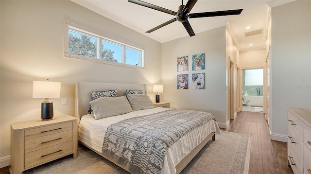 bedroom with multiple windows, crown molding, dark hardwood / wood-style flooring, and ceiling fan