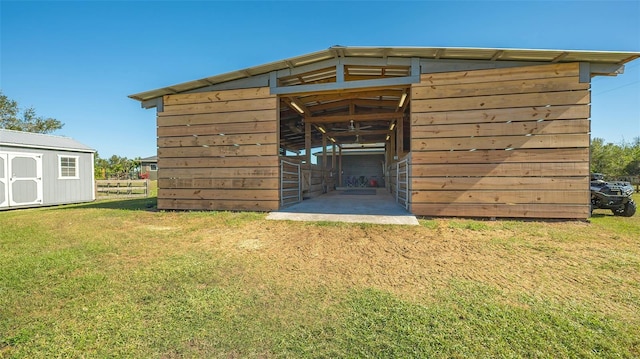 view of outdoor structure with a yard