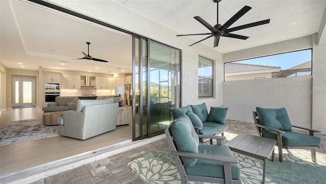 interior space featuring ceiling fan