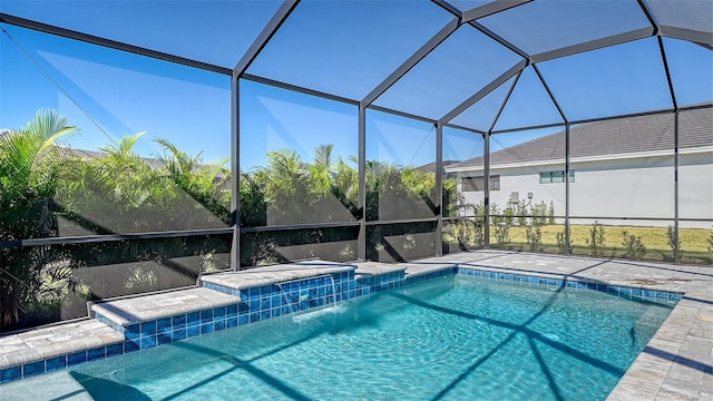 view of pool featuring a lanai and pool water feature