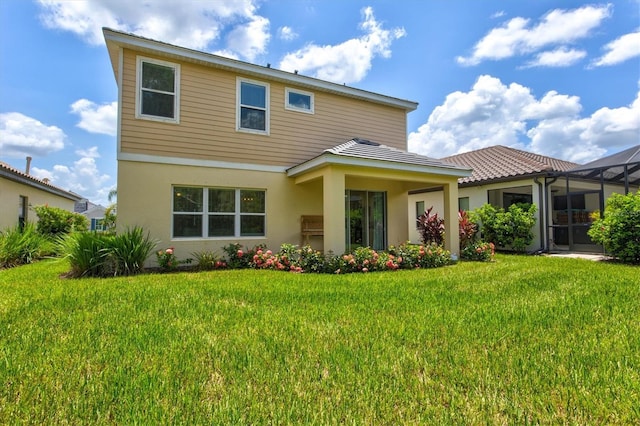 view of front of property with a front lawn