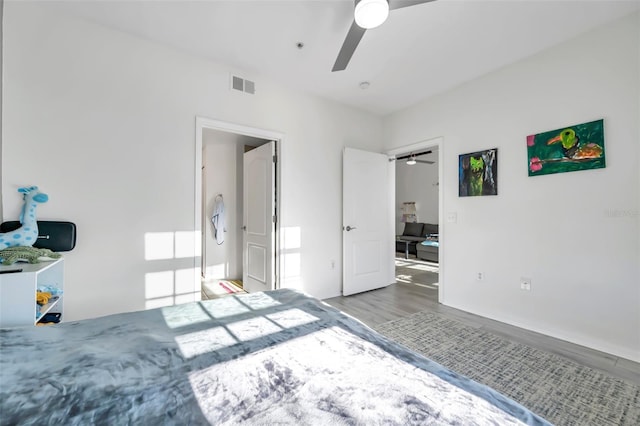 bedroom featuring ceiling fan and light wood-type flooring