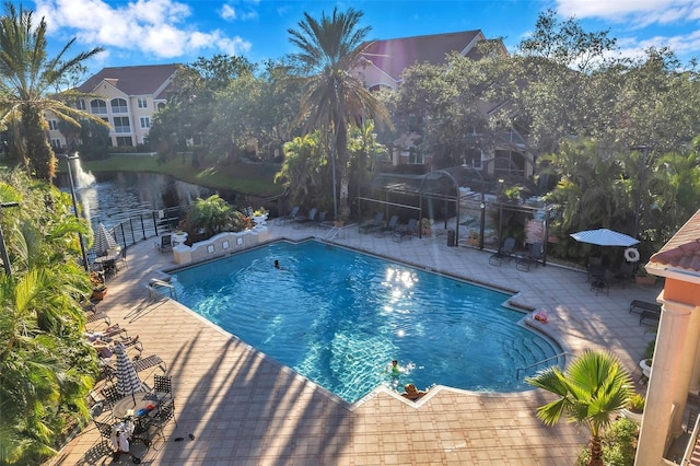 view of swimming pool featuring a patio