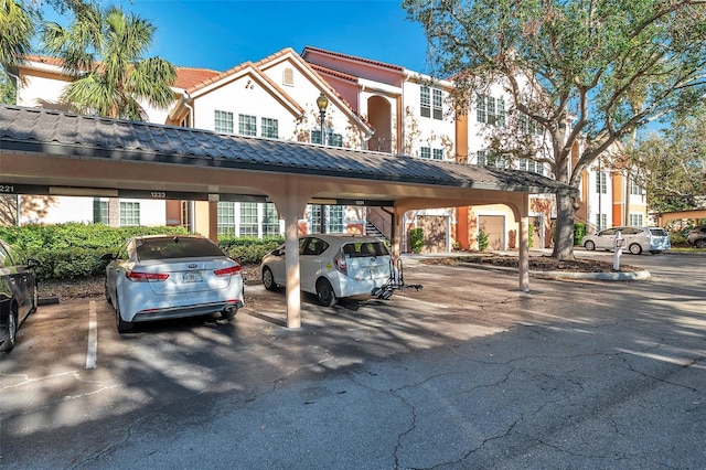 view of car parking with a carport