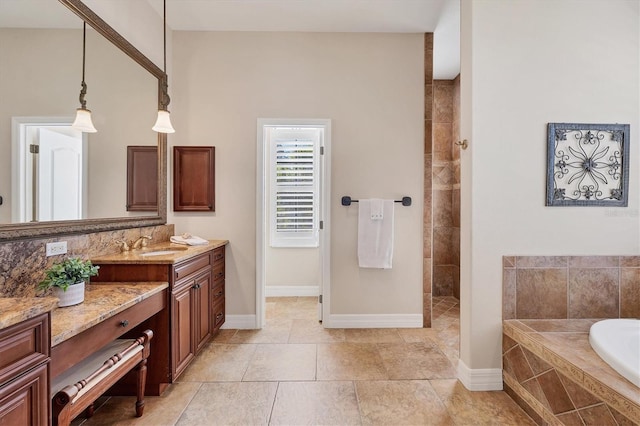 bathroom featuring vanity, tile patterned floors, and separate shower and tub