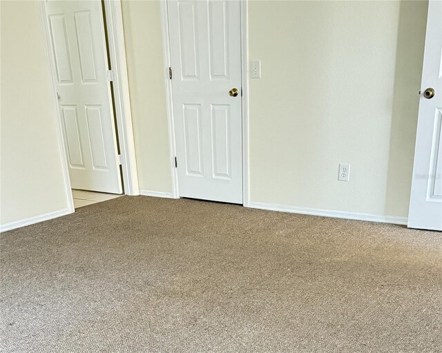 4042 Kingsfield Dr, Parrish, FL 34219 - unfurnished bedroom featuring carpet and baseboards