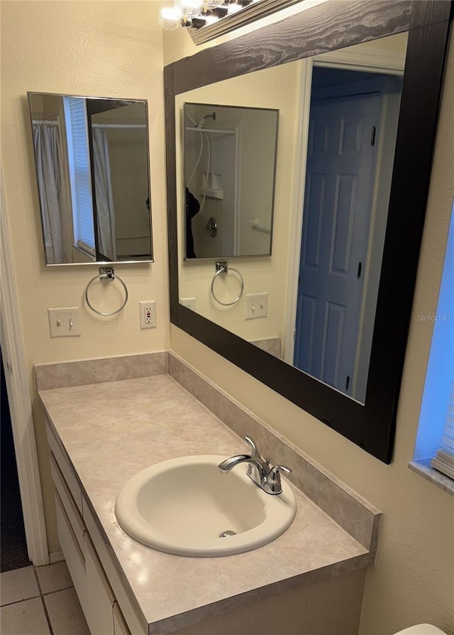 4042 Kingsfield Dr, Parrish, FL 34219 - bathroom with vanity, tile patterned floors, and toilet