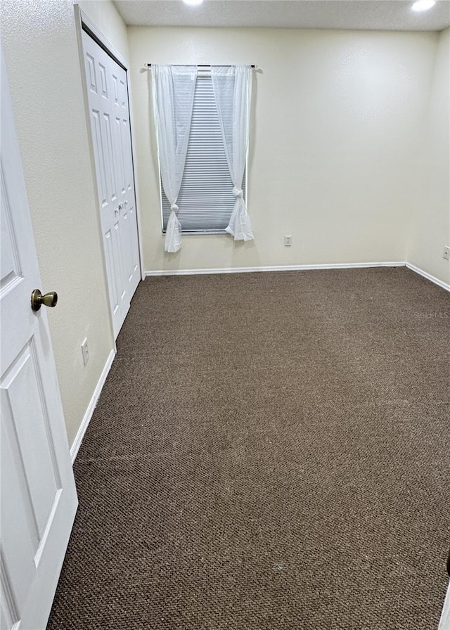 4042 Kingsfield Dr, Parrish, FL 34219 - unfurnished room with carpet floors and baseboards