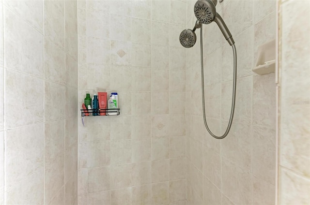 details with a tile shower