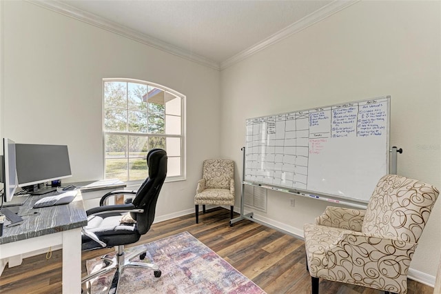 home office with dark wood-type flooring and ornamental molding