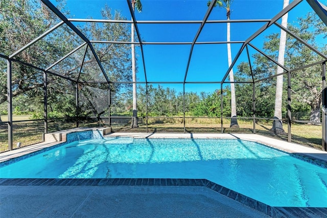 view of pool featuring pool water feature and a lanai