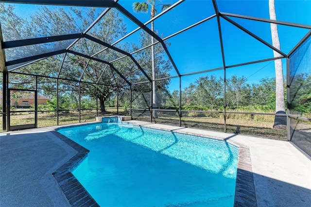 21709 Deer Pointe Xing, Bradenton, FL 34202 - swimming pool with glass enclosure and a patio area