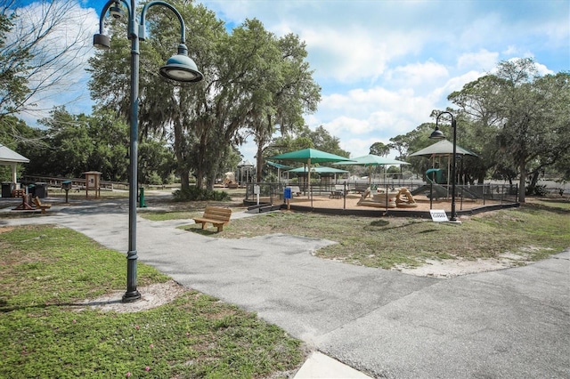 view of home's community featuring a playground