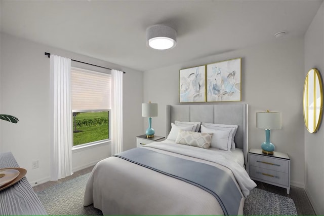 bedroom featuring multiple windows and light colored carpet