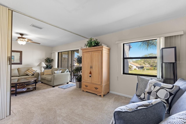 interior space featuring ceiling fan