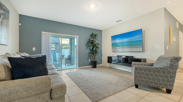 living room featuring light tile patterned flooring