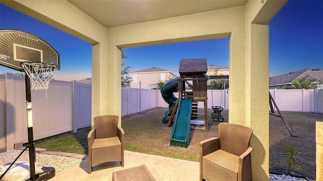 view of patio with a playground