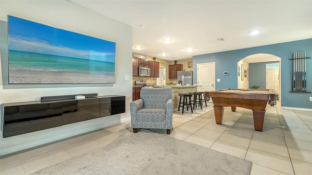 recreation room with light tile patterned floors and pool table