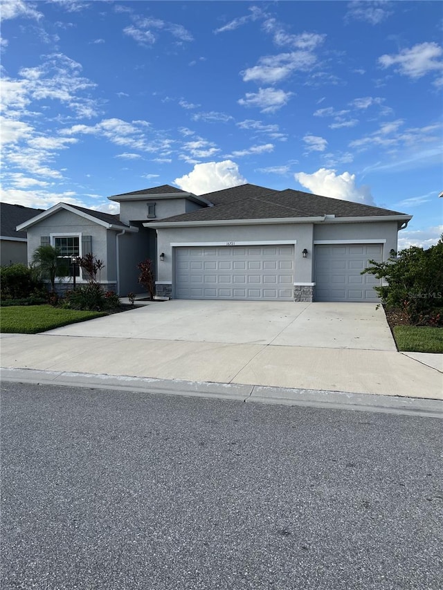 view of front of property with a garage