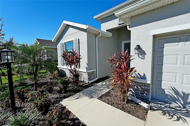 property entrance featuring a garage