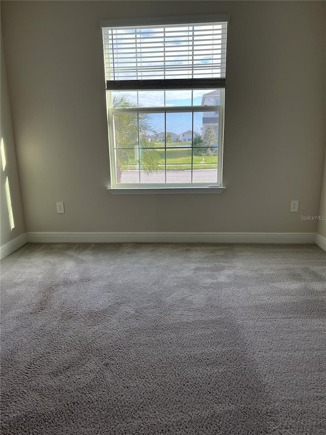 view of carpeted spare room