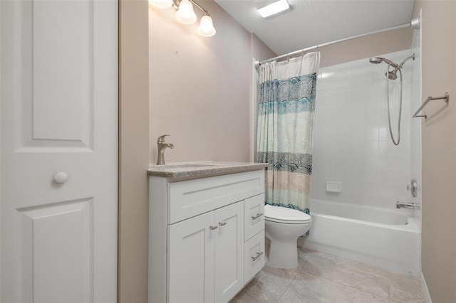 full bathroom featuring shower / bath combination with curtain, tile patterned floors, vanity, a textured ceiling, and toilet