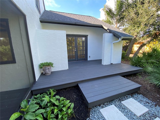 wooden deck featuring french doors