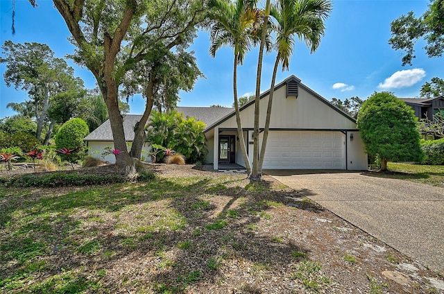 single story home featuring a garage