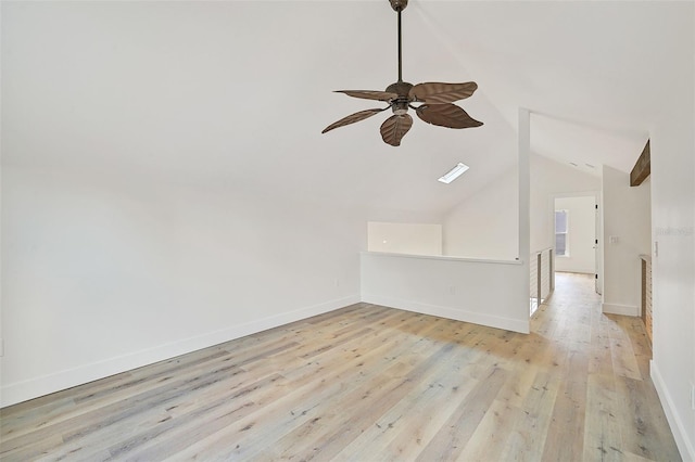 additional living space with vaulted ceiling, ceiling fan, and light hardwood / wood-style floors