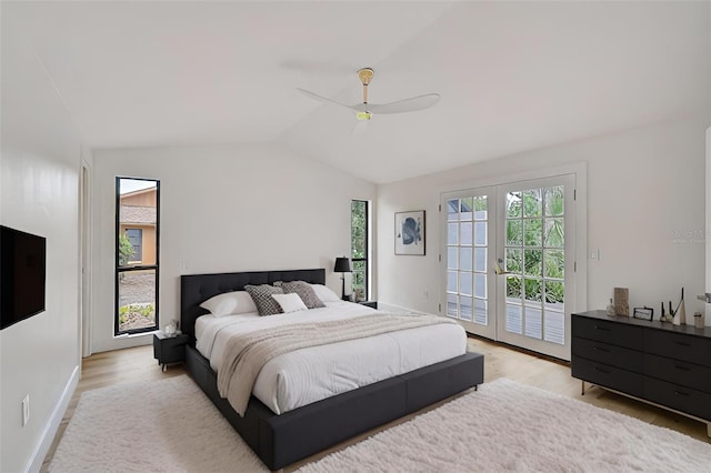 bedroom with lofted ceiling, access to outside, ceiling fan, light hardwood / wood-style floors, and french doors