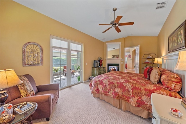 bedroom with access to exterior, light colored carpet, ceiling fan, and lofted ceiling