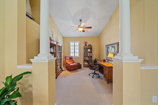 office area featuring light carpet, ceiling fan, and lofted ceiling