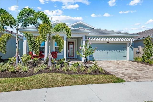 view of front of property featuring a garage