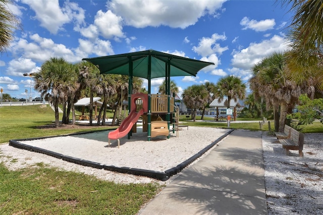 view of play area featuring a lawn