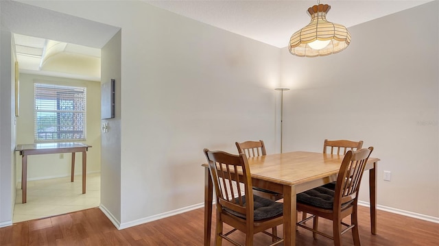 dining space featuring hardwood / wood-style floors