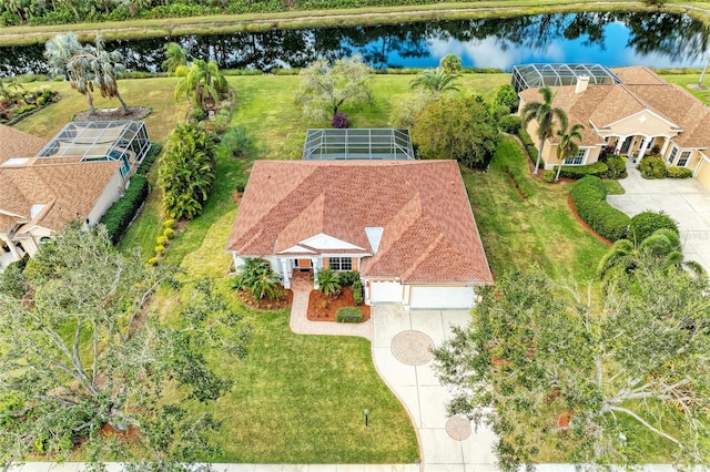 drone / aerial view featuring a water view