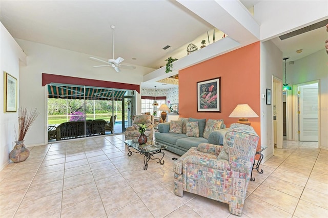 tiled living room with ceiling fan