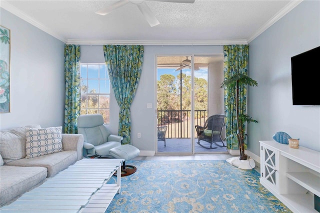 living room with a textured ceiling and ornamental molding