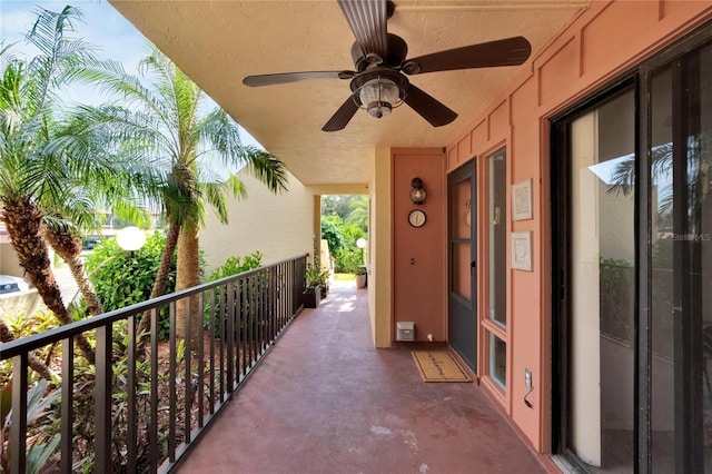 view of patio / terrace featuring ceiling fan and a balcony