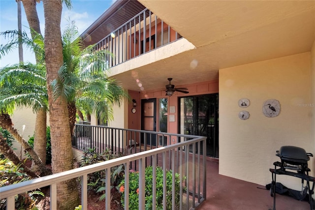 balcony with ceiling fan and a grill